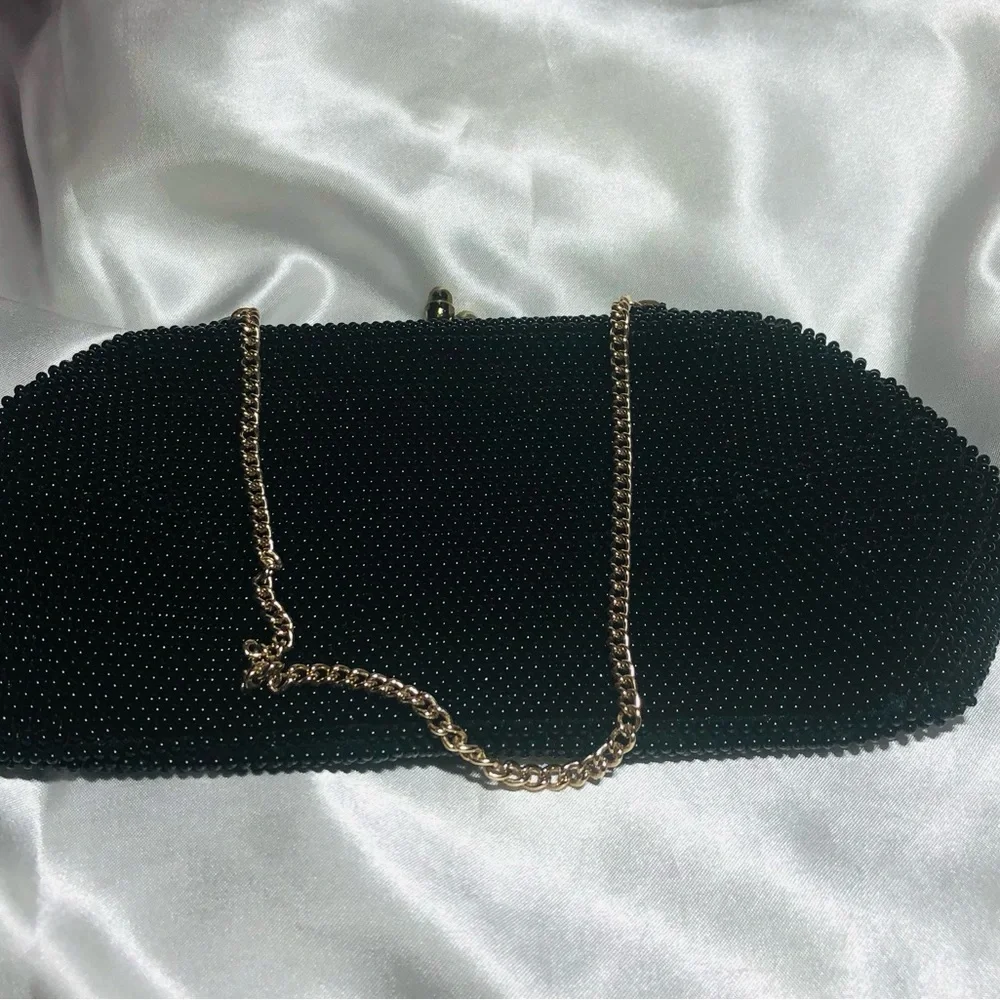 Antique vintage black beaded purse with chain handle.